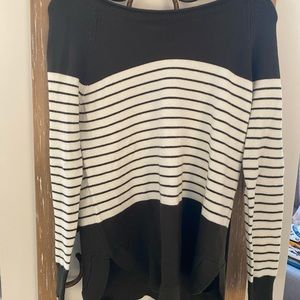 Green and white sweater with stripes